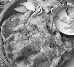 Chur chur Aloo Paratha with butter and curd