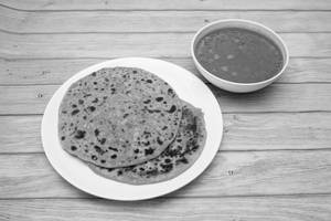 1 Aloo Paratha With 1 Gobi Paratha And Chana Masala