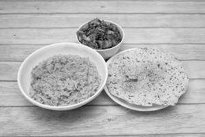 Dal Rice With Aloo Fry And Roasted Papad