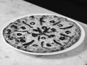 Sun Dried Tomato Corn Olive Pizza