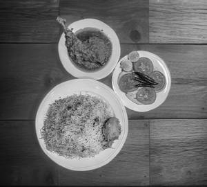 Egg Aloo Biryani + Chicken Chaap + Salad