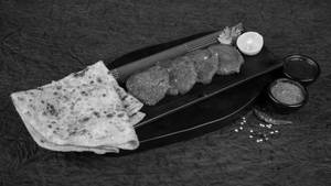 Galouti Kebab Served Rumali Roti  Or Paratha