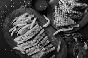 Grilled Chicken Pesto Sandwich With French Fries And Ketchup