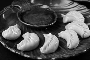 Pork Steamed Momos [8 Pieces]