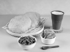 Chole Bhature + Choice Of Lassi