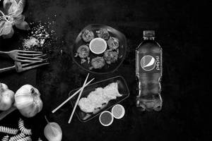 Chicken Malai Momos (6pc) + Chicken Tandoori Momos (6pc) + Pepsi