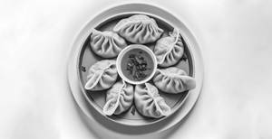 Veg Steamed Momos [8 Pcs]