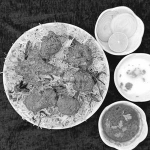 Hyderabadi Mutton Fry Pieces Biryani .