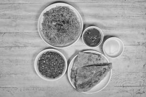Half Boti Kabab + Qtr Chicken Biryani + 2 Paratha                         