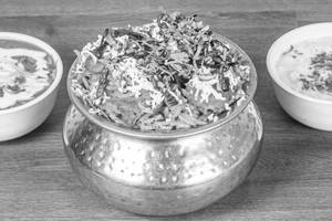 Veg Biryani [with Gravy and Raita]