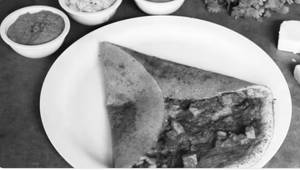 Paneer Schezwan Dosa (Served with Cocunut Chutney, Red Chutney and sambar)