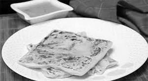 Egg Veechu Parotta