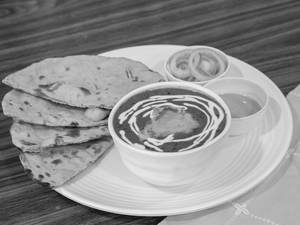 Dal Makhani With Lachha Paratha And Raita
