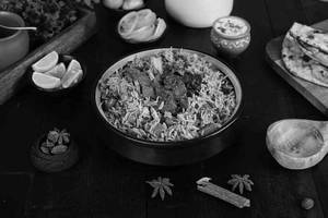 Mutton Biryani [Served With Raita]