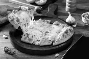 Exotic Veg Cheese Garlic Bread   
