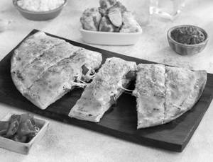 Red Paprika And Paneer Stuffed Garlic Bread