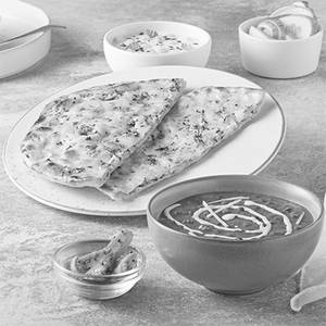 Paneer Kulcha With Dal And Raita