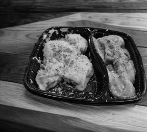 Chicken Afghani Momos (5Pcs) + Chicken Pizza Momos (5Pcs)