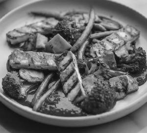 Grilled Paneer Steak Served With Saute Vegetables [paneer 150 Gram And Veggies 200 Gram]