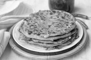 Aloo paratha with curd