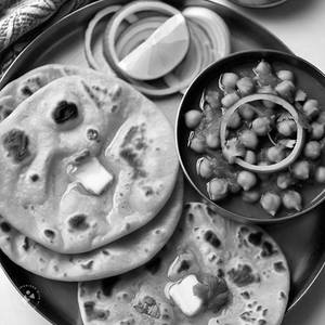 Chana Masla + 1 Missi Roti+ 2 Butter Roti