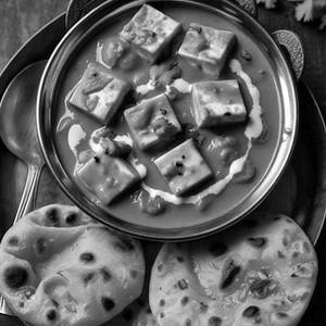 Paneer Butter Masala + 4 Butter Roti