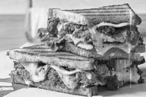 Schezwan Veg Cheese Grill Sandwich 