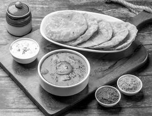 Poori (5 Pcs), Aloo Tamatar Sabzi And Raita