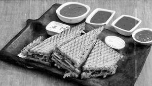 Schezwan Veg Grill Sandwich 
