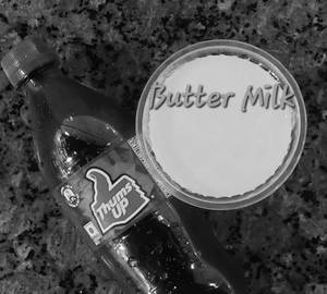 Thumsup 250ml and 1 glass butter milk