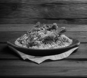 Chicken Biryani(Serves With Raita)
