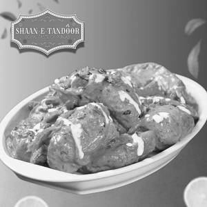 Gravy Paneer Momos