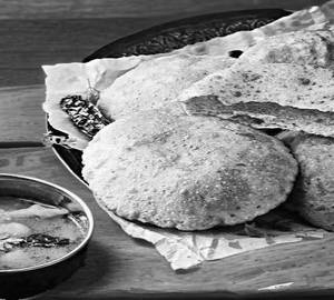 Bedai with aloo sabzi