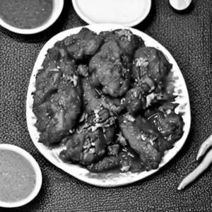 Pritys Kitchen Special Dry Chilli Chicken     