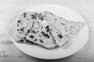 1 Tandoori Butter Naan