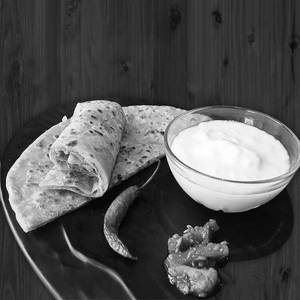 Aloo Paratha 2  Pcs With Crud