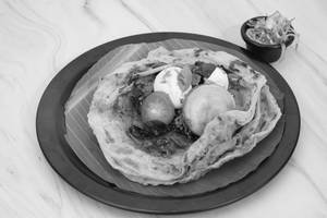 Kizhi Parotta Chicken