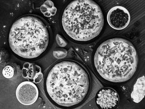Four Pizza Combo (double Topping)