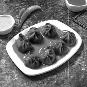 Veg Tandoori Gravy Momos