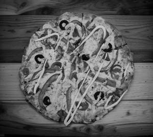 Pushpa the fire Pizza