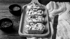 Cheese Burst Herbed Butter Garlic Bread