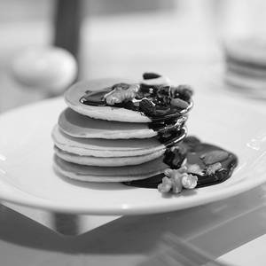 Pancakes With  Mix Nuts And Chocolate