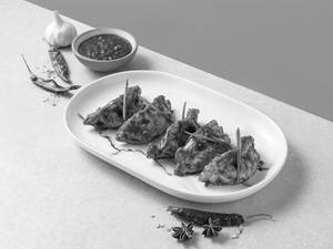 New! Chicken Schezwan Momos