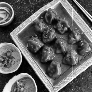 Veg Dumplings In Smoked Manchurian Sauce