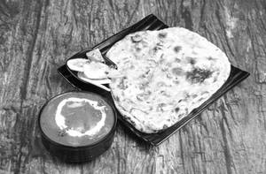 Butter Paneer Masala + Tandoori Butter Roti (2 Pc)