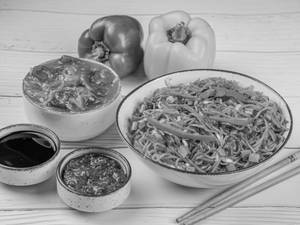 Triple Schezwan Noodles With Gravy