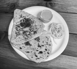 Rajasthani Ajwain Paratha with creamy curd Green Mirchi  Achar