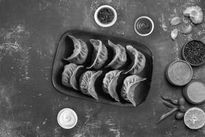 Chicken momos [8 pieces]