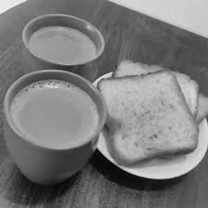 Adrak Milk Tea (Serves 2 Persons) With Butter Toast