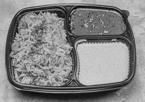 Egg Biryani With Raita & Salan
